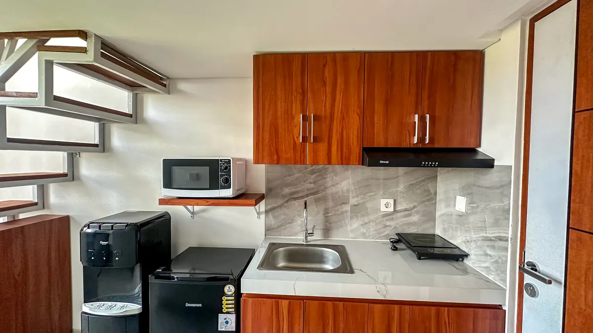 Kitchenette with microwave, fridge and water dispenser